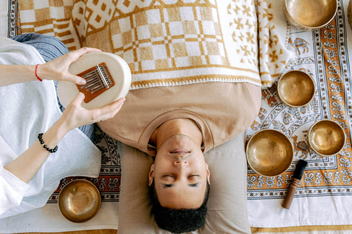 A man relaxing while listening to sounds 